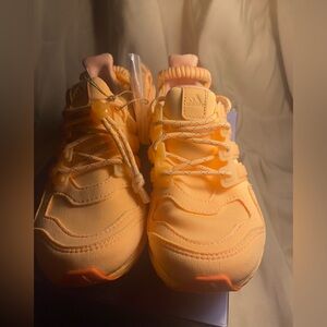 adidas Women's Sneakers in Bright Orange